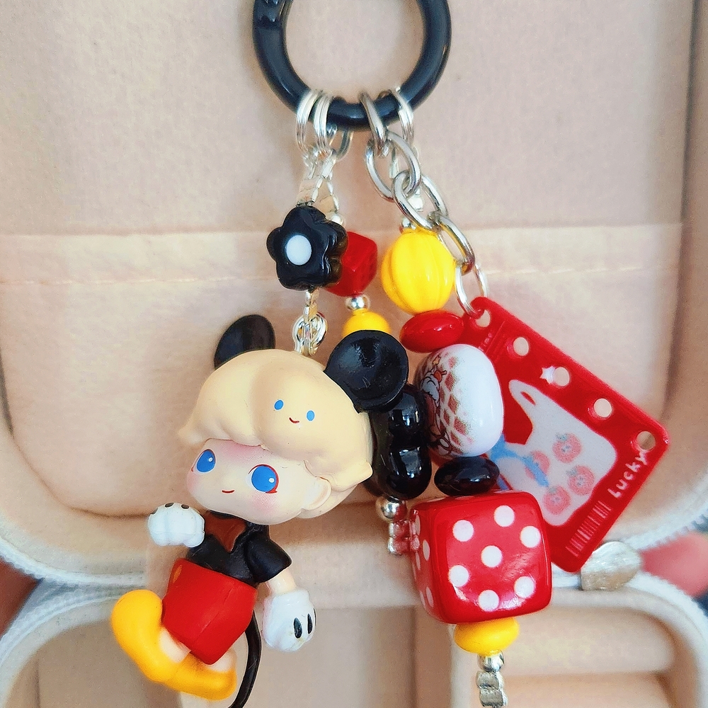 Charming Cartoon Character Keychain with Red and Yellow Accents